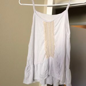 White tank with a cutout from Brazilian boutique
